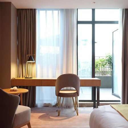 Baian Art Hotel Лучжоу Экстерьер фото