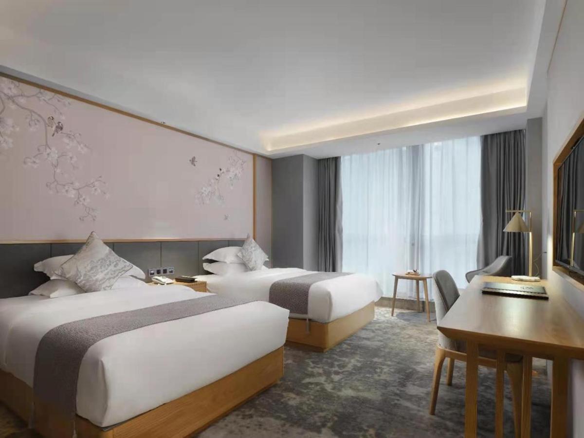 Baian Art Hotel Лучжоу Экстерьер фото