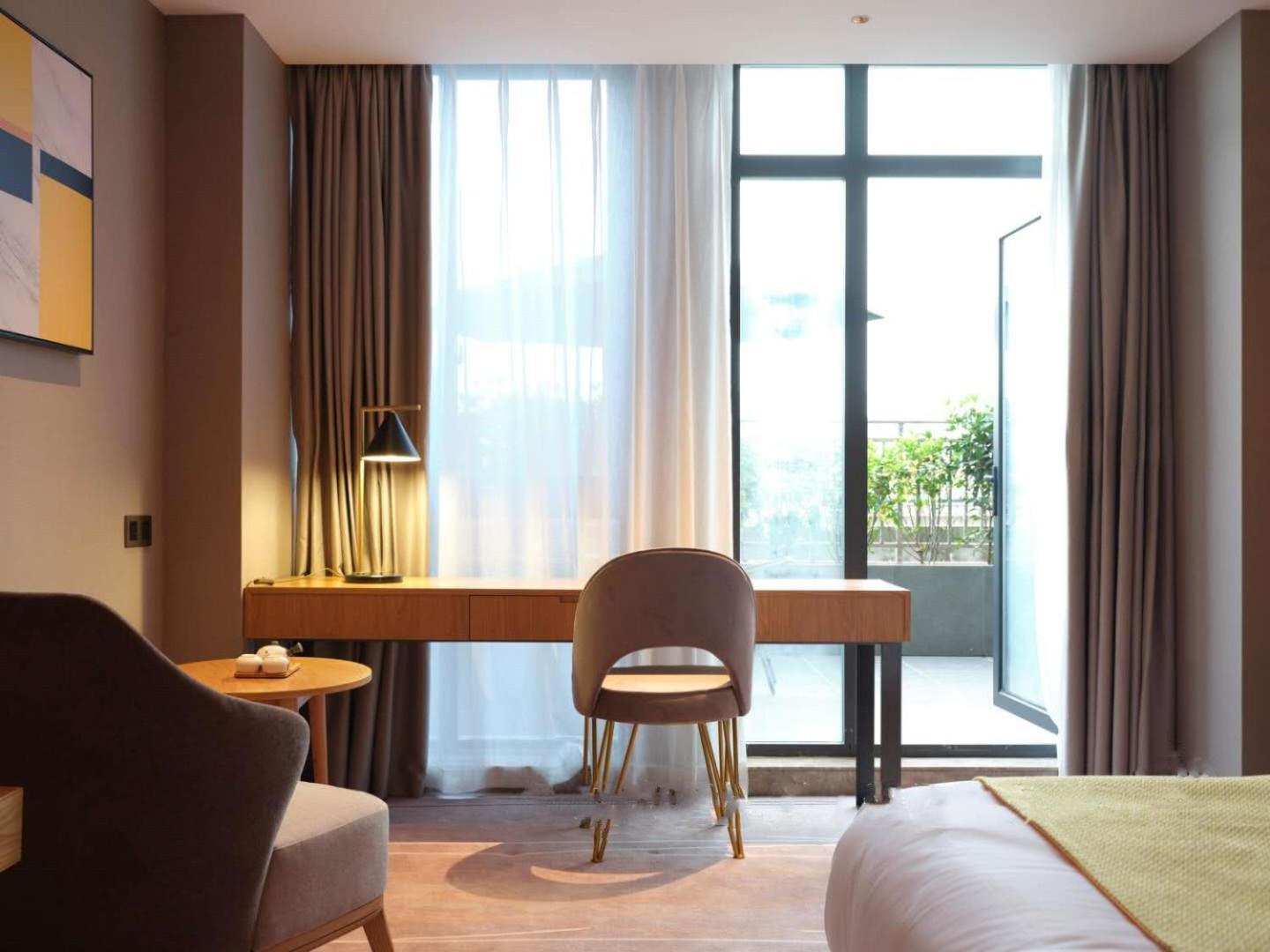 Baian Art Hotel Лучжоу Экстерьер фото